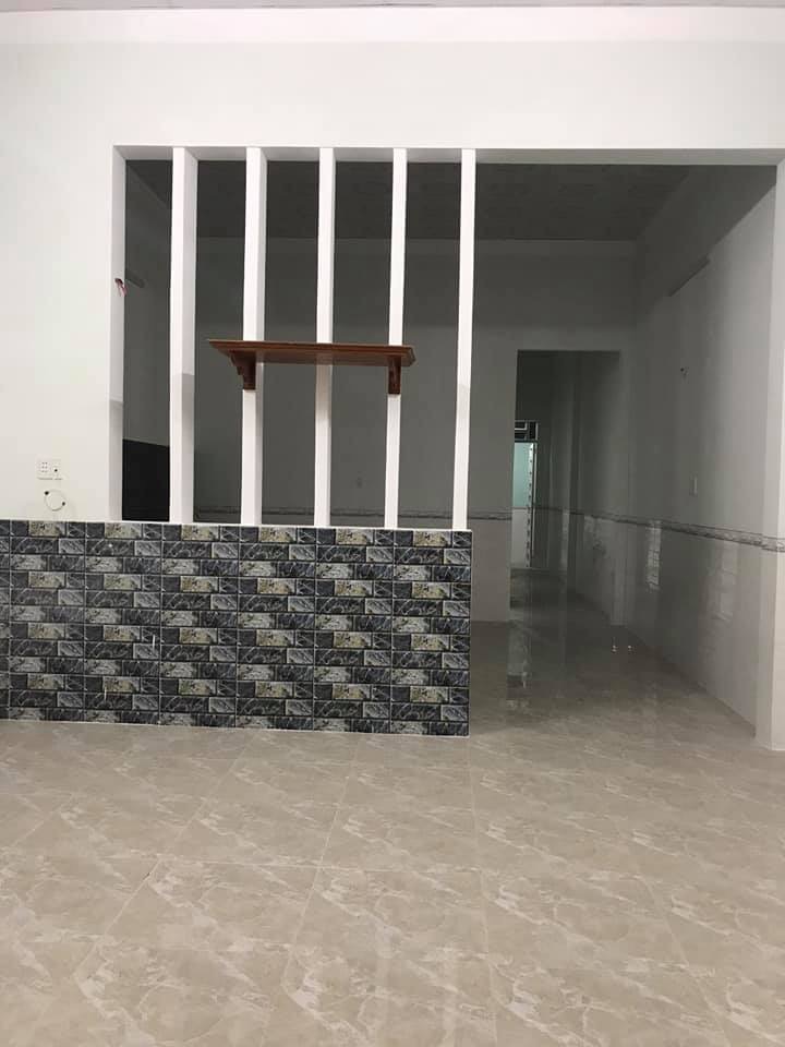 Cần bán nhà mới xây dt 5*25*100tc gần trường y Đồng xoài